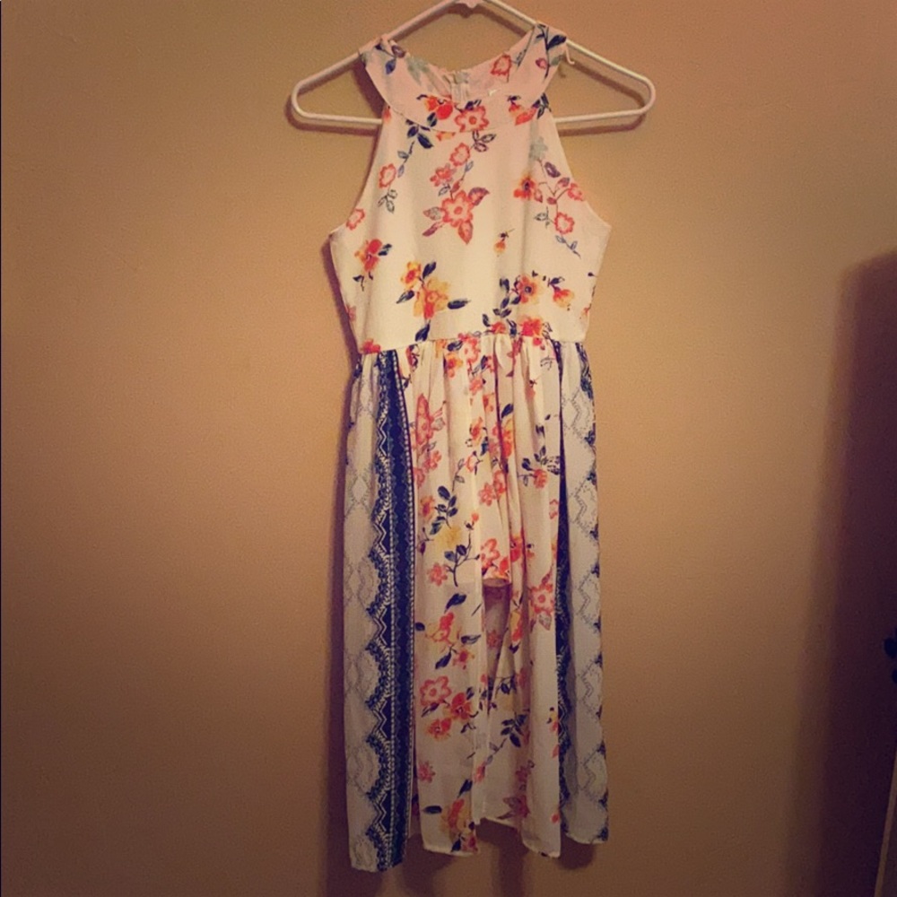 halter neck romper with a train.